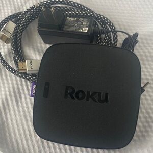 Roku 4640X model. Streaming device adapter and HDMI cable